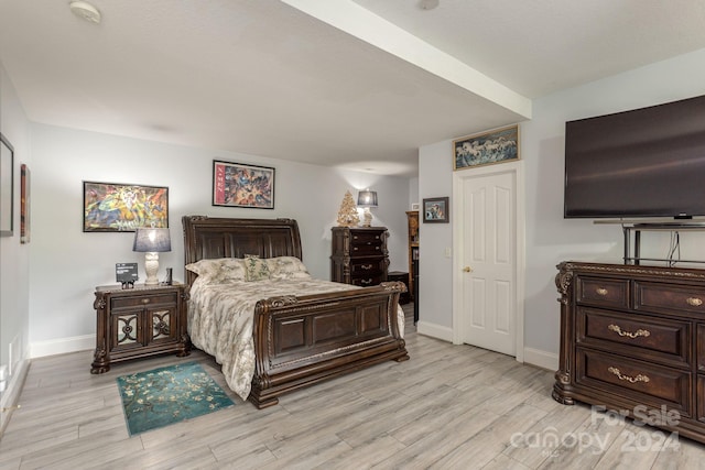 bedroom with light hardwood / wood-style flooring