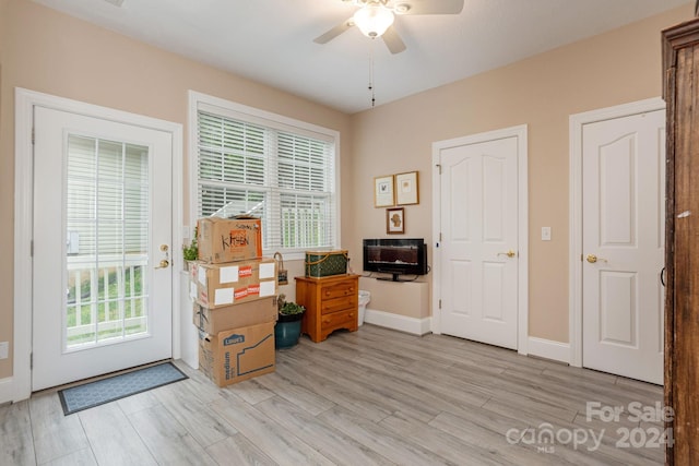 office space with ceiling fan and light hardwood / wood-style floors