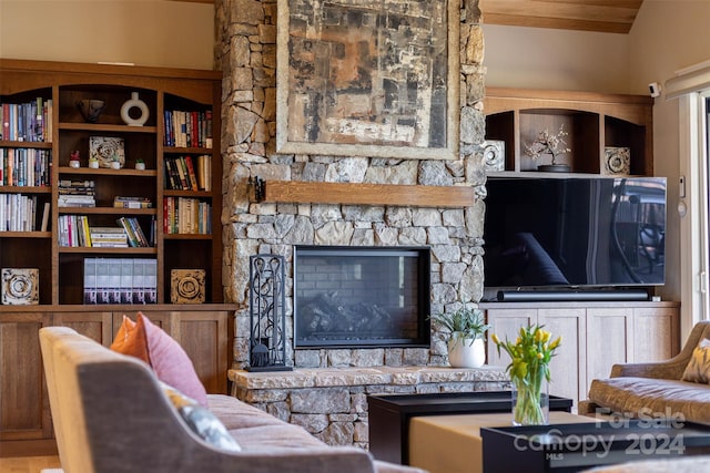 living room featuring a fireplace