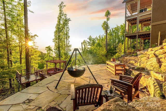 view of patio terrace at dusk