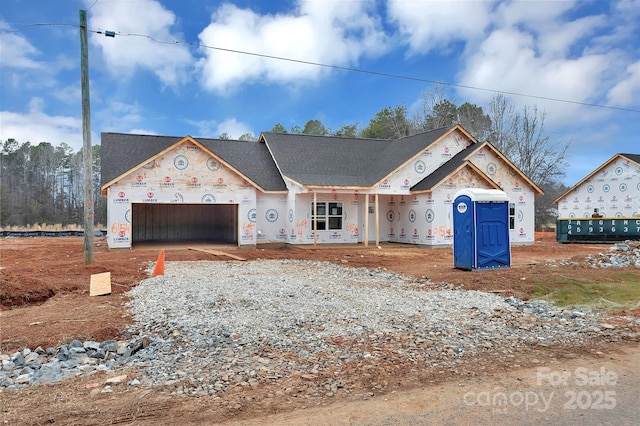 property in mid-construction featuring a garage