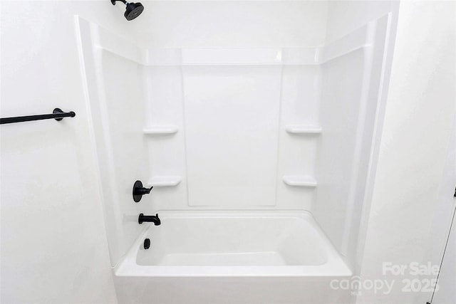 bathroom featuring shower / washtub combination