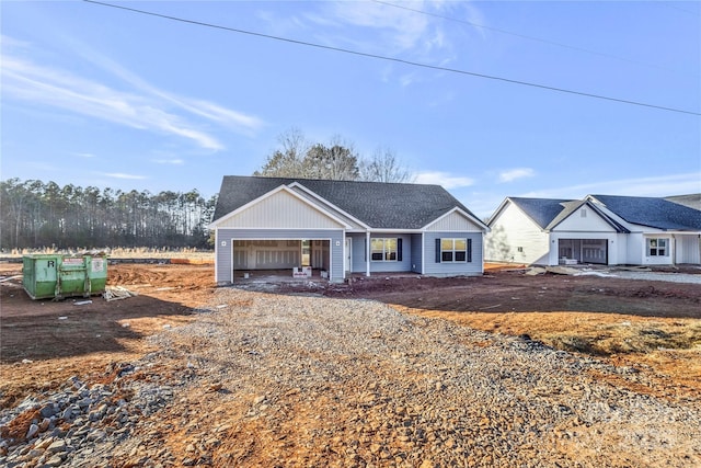 view of front of property with a garage