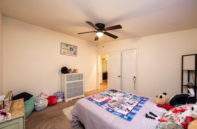 carpeted bedroom with ceiling fan