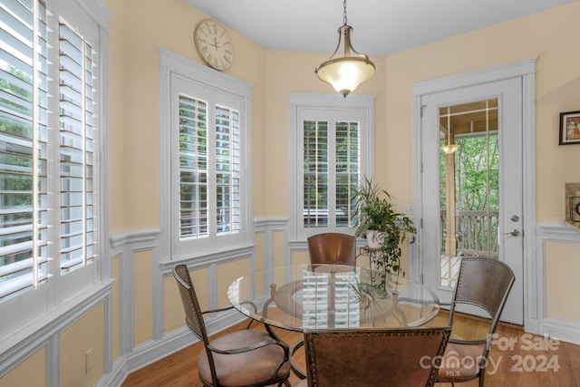 dining room with light wood-type flooring