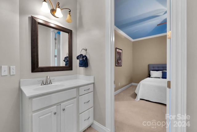 bathroom featuring vanity and ornamental molding