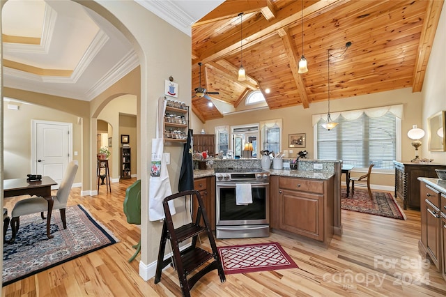 kitchen with light hardwood / wood-style floors, hanging light fixtures, stainless steel electric stove, light stone counters, and ceiling fan