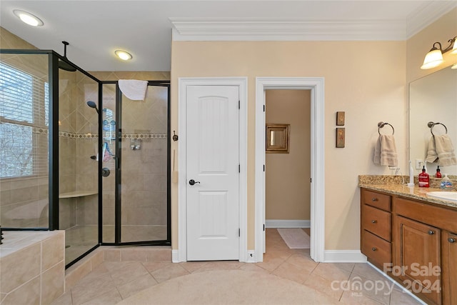 bathroom featuring tile floors, walk in shower, ornamental molding, and vanity