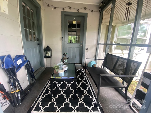 sunroom / solarium with a healthy amount of sunlight