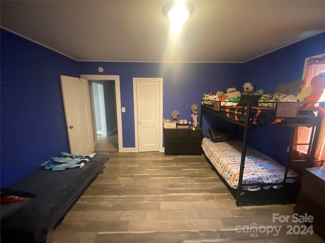 bedroom featuring hardwood / wood-style flooring