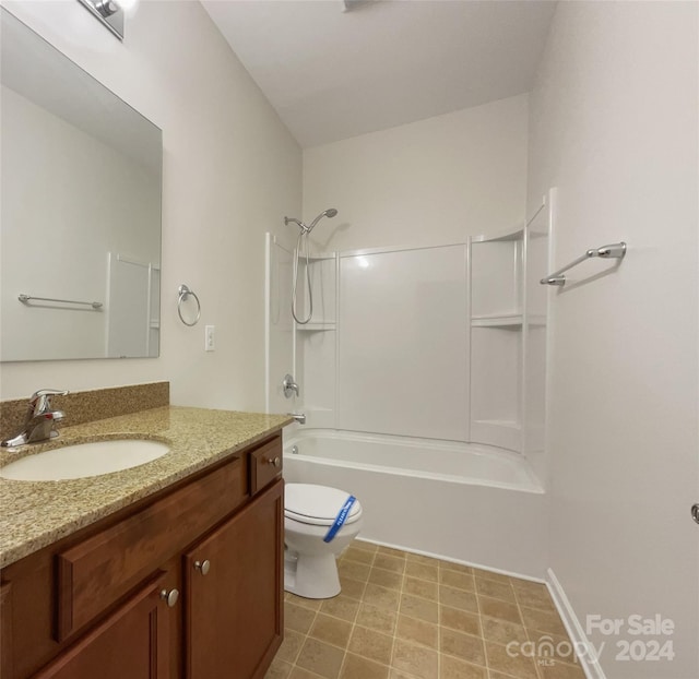 full bathroom featuring tile floors, toilet, oversized vanity, and shower / bathing tub combination