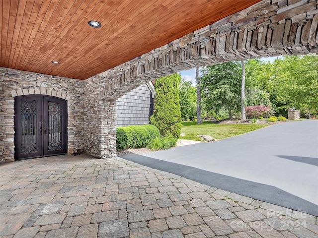 property entrance featuring french doors