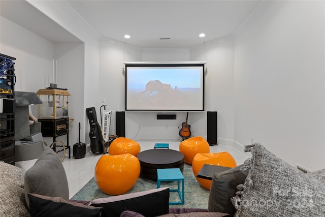 home theater room with crown molding