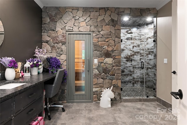 office area featuring built in desk and crown molding