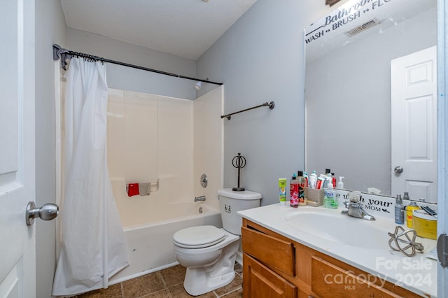 full bathroom with toilet, shower / bath combo, and vanity