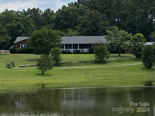 exterior space with a water view