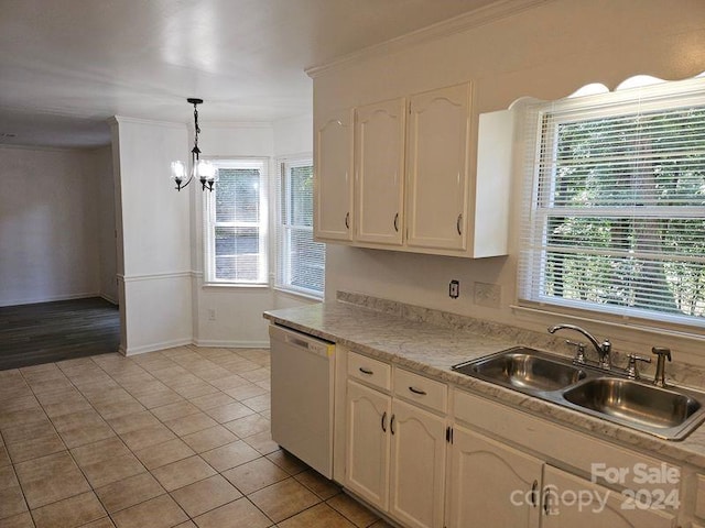 kitchen featuring sink, dishwashing machine, light tile flooring, and white cabinetry