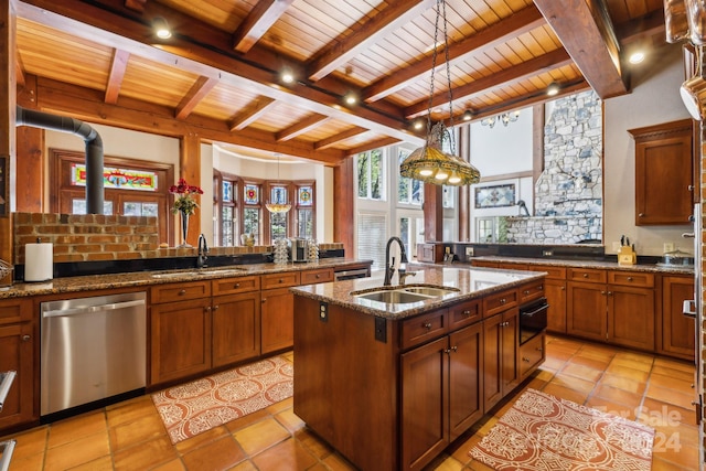 kitchen featuring beamed ceiling, sink, light tile flooring, and stainless steel dishwasher