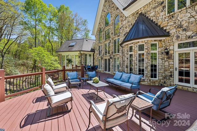 deck with an outdoor living space