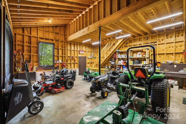 garage with a workshop area