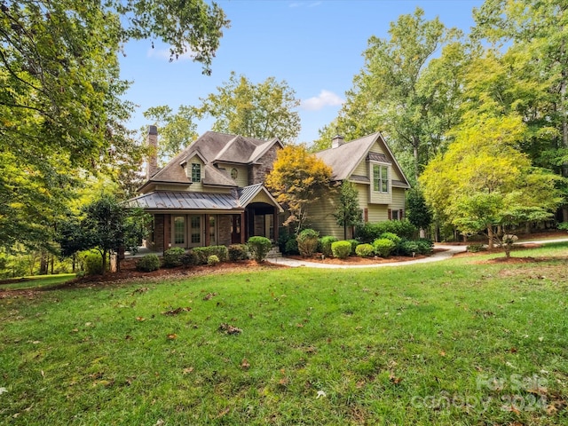 view of front of home with a front lawn