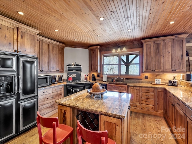 kitchen featuring light hardwood / wood-style floors, a kitchen island, wood ceiling, sink, and refrigerator with ice dispenser