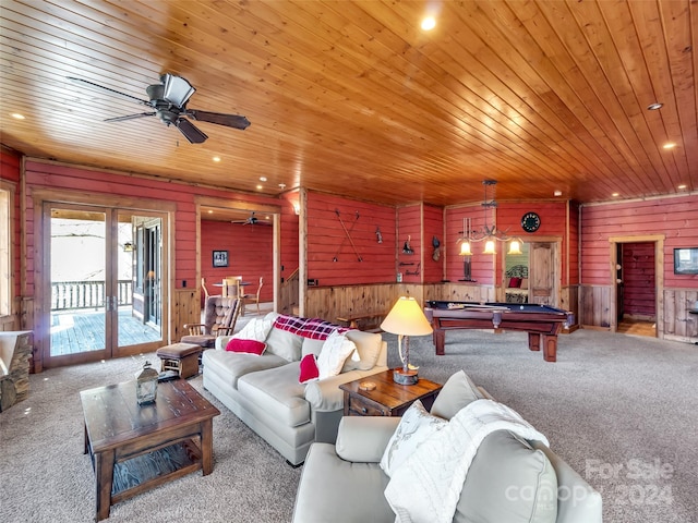 living room with ceiling fan, wooden walls, carpet flooring, billiards, and wooden ceiling