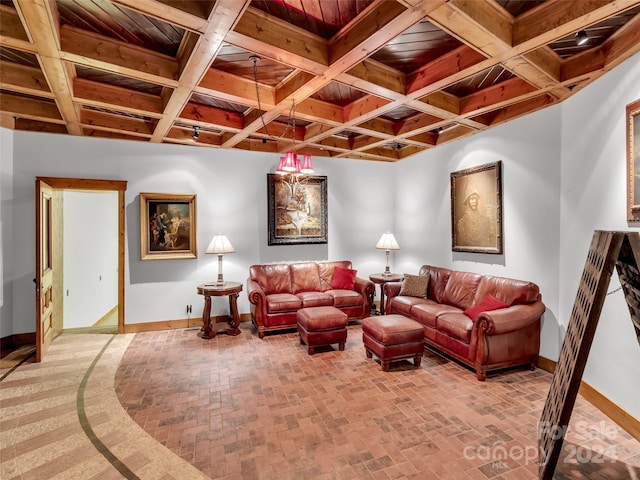 living room featuring coffered ceiling and wood ceiling