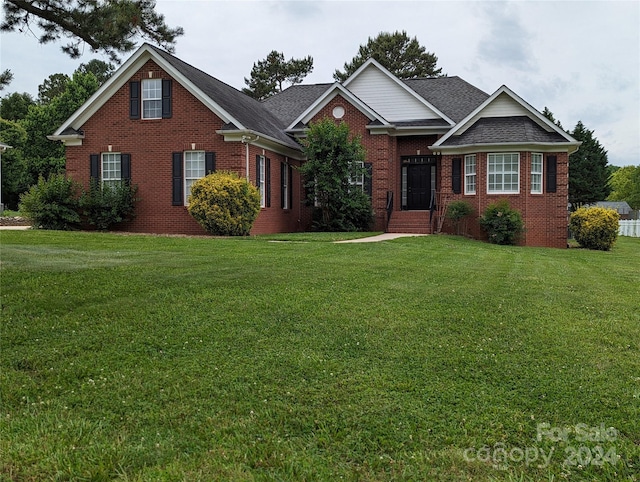 view of front of home with a front yard