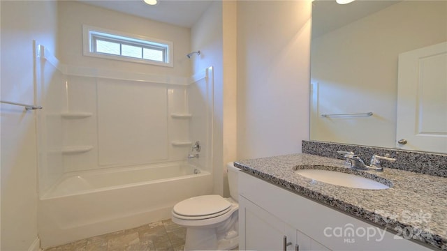 full bathroom featuring tile floors, oversized vanity, toilet, and shower / bathing tub combination