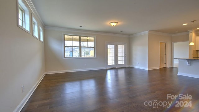 interior space featuring dark hardwood / wood-style floors and crown molding