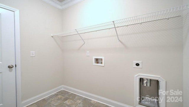 laundry room featuring ornamental molding, washer hookup, hookup for an electric dryer, and dark tile floors