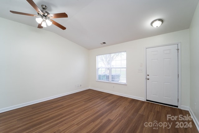 foyer with hardwood / wood-style flooring, lofted ceiling, and ceiling fan