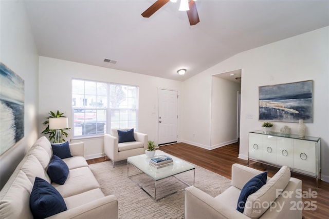 living room with vaulted ceiling, hardwood / wood-style floors, and ceiling fan