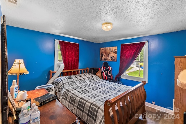 bedroom with a textured ceiling