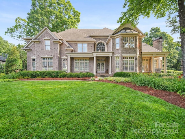 view of front of home featuring a front lawn