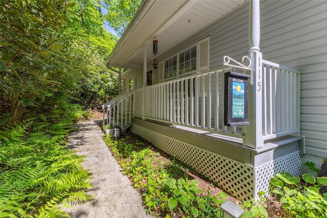 view of side of home featuring a porch