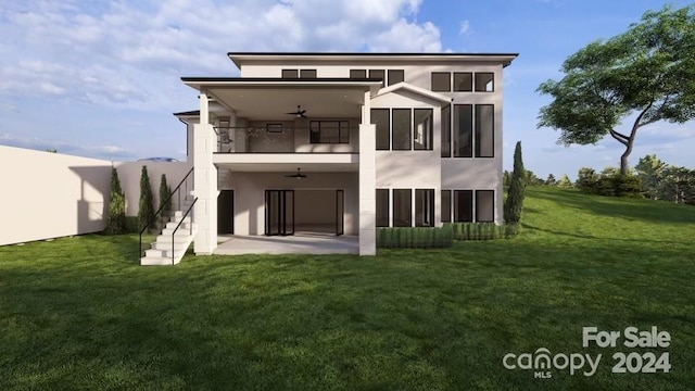 rear view of property featuring ceiling fan, a balcony, a lawn, and a patio