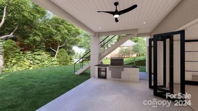 view of patio / terrace with ceiling fan, an outdoor kitchen, and grilling area