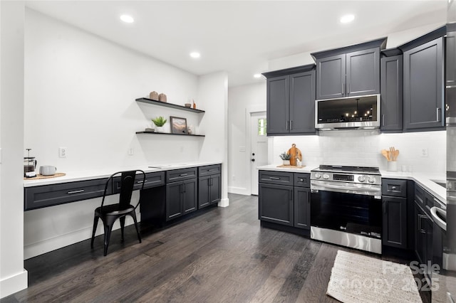 kitchen featuring tasteful backsplash, stainless steel appliances, and dark wood-type flooring