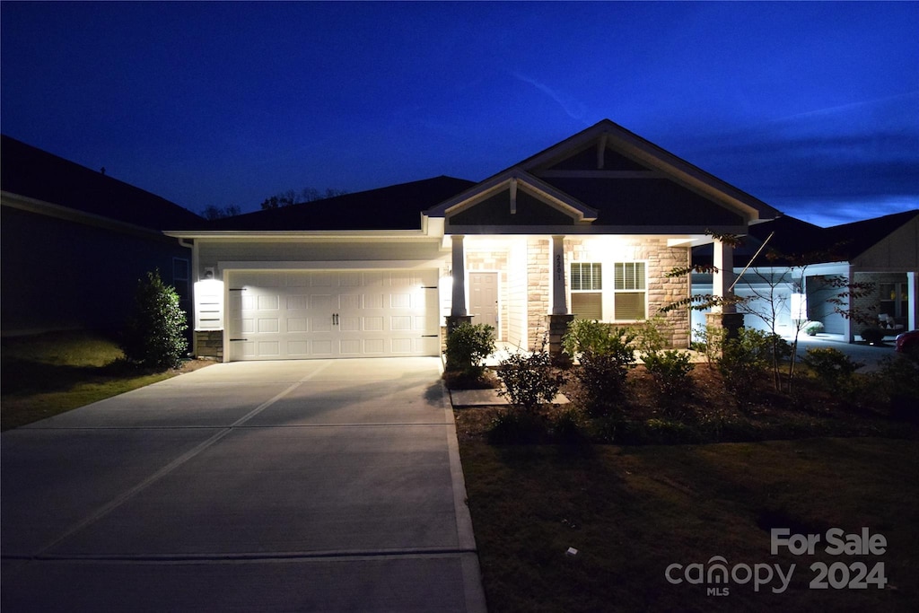 view of front of property with a garage