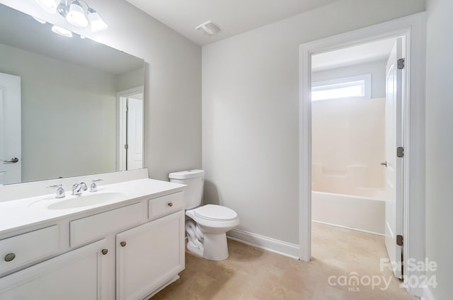 full bathroom with vanity, toilet, and shower / bathing tub combination