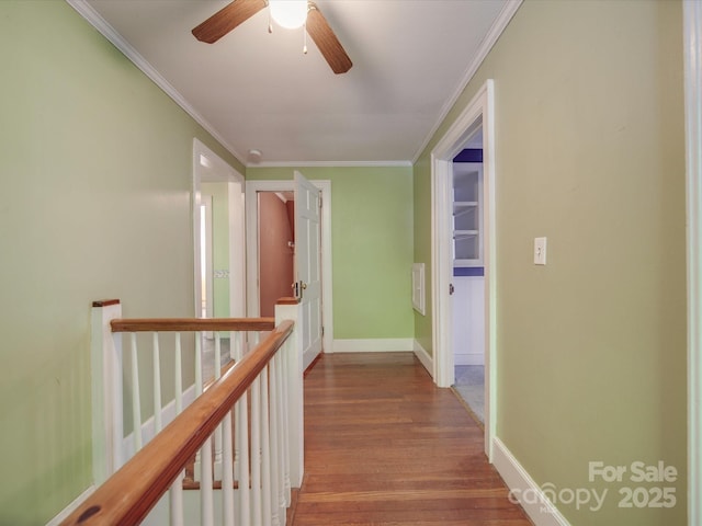 hall featuring crown molding and wood-type flooring