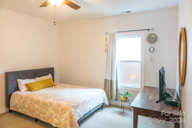 carpeted bedroom featuring ceiling fan