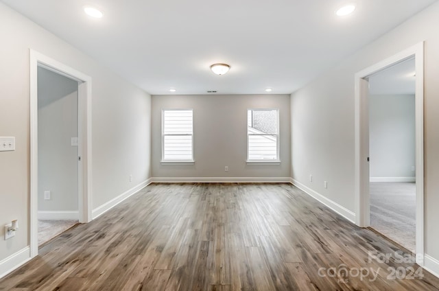 spare room featuring hardwood / wood-style floors