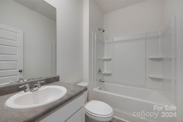 full bathroom featuring shower / washtub combination, vanity, and toilet