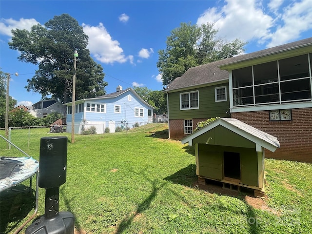 view of yard featuring a trampoline