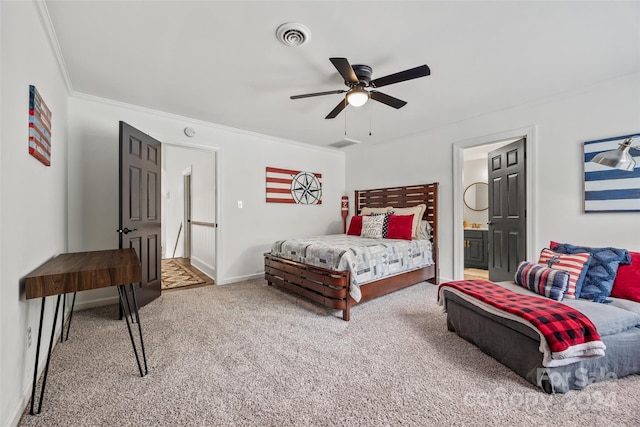 bedroom with crown molding, ceiling fan, ensuite bathroom, and carpet flooring