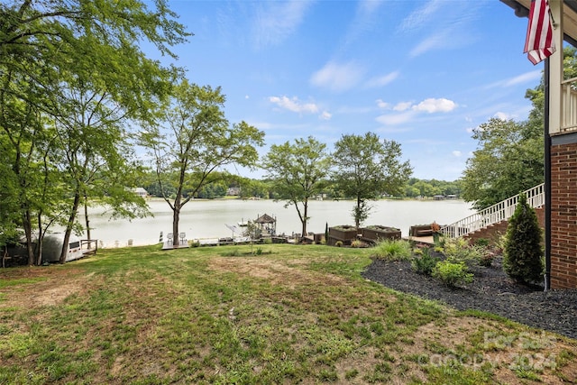 view of yard with a water view