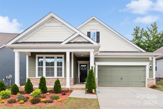 craftsman-style home featuring a garage